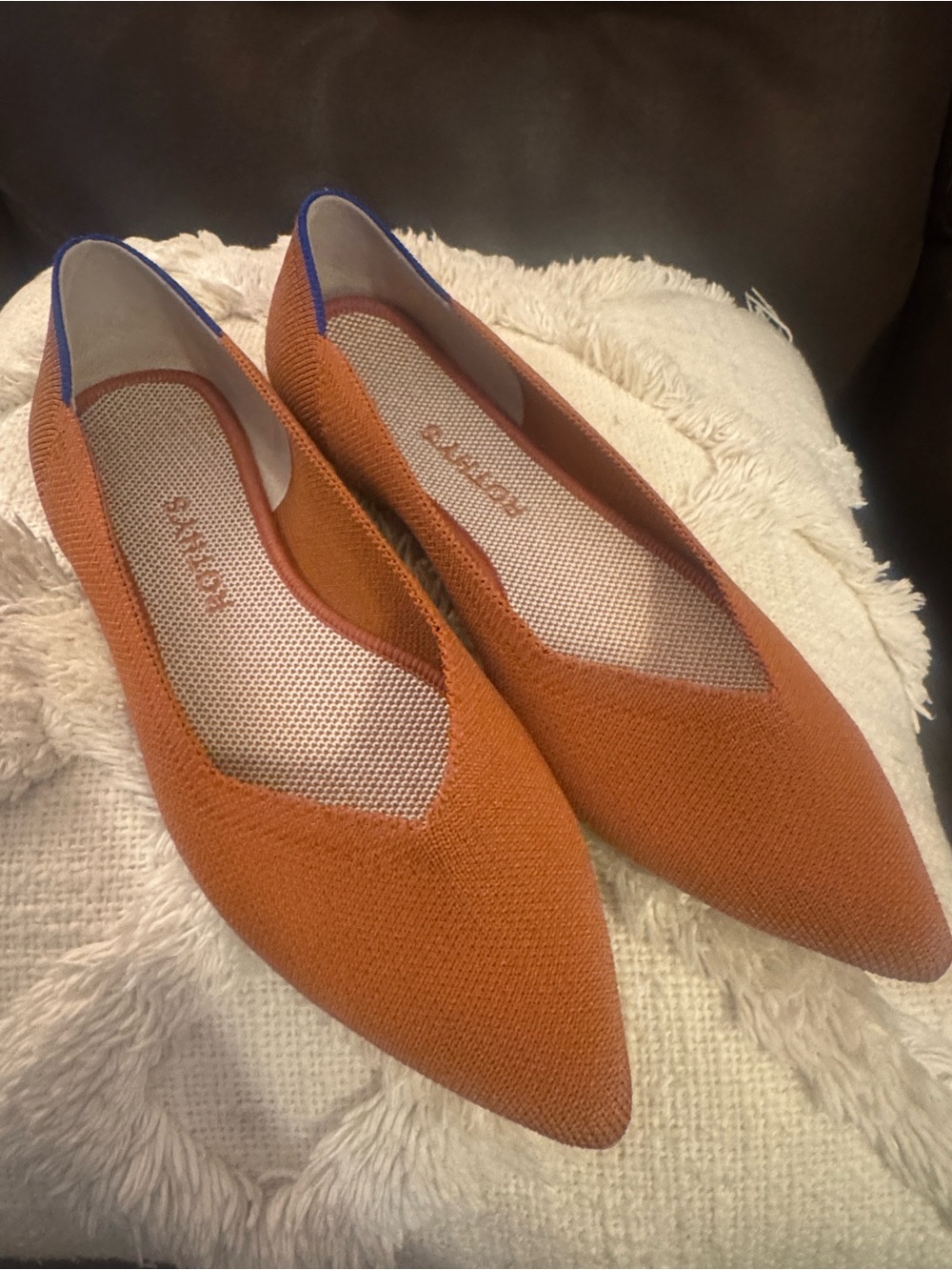 Rothy's Pointed Knit Flats in Burnt Orange with Blue Trim